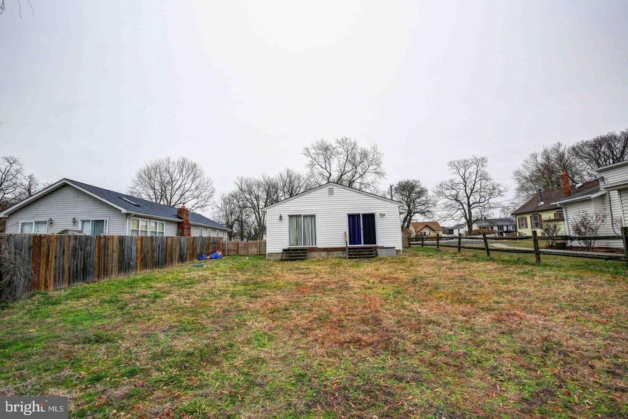 LOCATION, LOCATION, LOCATION.....just steps to the community beach, enjoy the water privilege community of Paradise Beach.   Updated kitchen with granite counter tops, maple cabintry, hardwood flooring, breakfast bar  and stainless steel appliances.   Wood stove will help keep you warm on those cold nights.  Large back yard waiting for you to make your private oasis.  County installed new septic in 2016, new second floor roof in 2019