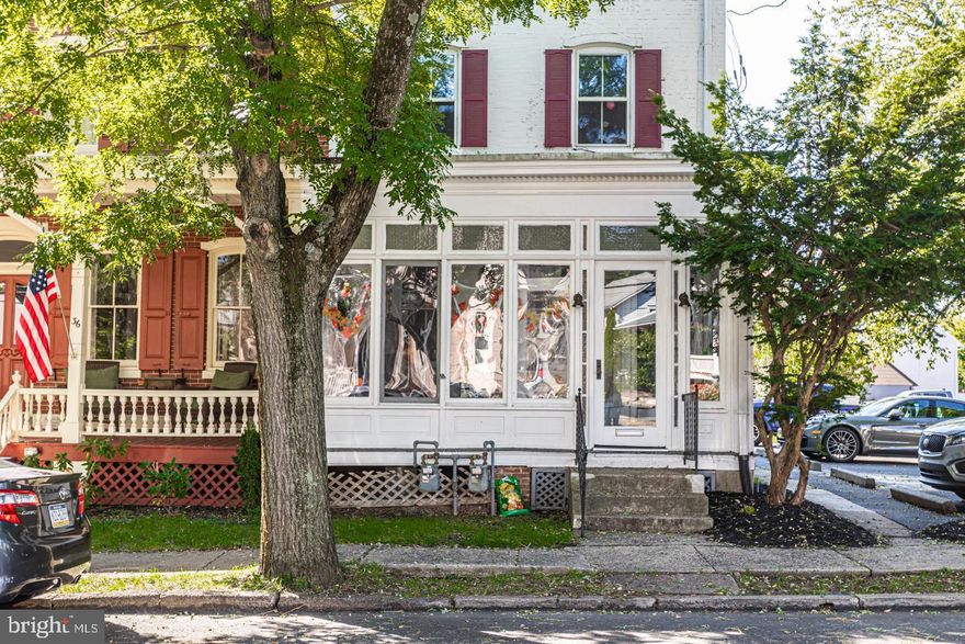 Available June 1, 2025 STYLISH TWO BEDROOM BORO RENEWAL - Enter through an enclosed glass porch with enough room for friends and fun year round. Wood floors, high ceilings, updated paint & finishes abound. A large well lit livingroom has entry to a recently improved tiled bathroom, and leads to the 2nd bedroom and new kitchen with stainless steel appliances, lots of granite counterspace, muted cabinetry galore & recessed overhead lighting. A short hallway has a closet containing a washer/dryer and the door to the bright main bedroom. Centrally located in Doylestown Boro, this could be your next home! There is a wealth of resources and recreation within walking distance including shopping, restaurants, museums, the public library, the regional rail and other public transportation. If there is ever a walkable town, this is it! One off-street assigned parking space is provided with the rental. Pets will be considered on a case-by-case basis for additional feee. The unit is occupied. Please contact listing agent to make arrangements. Credit of 620 or better requirted along with three months to move in (first, last and sec deposit).