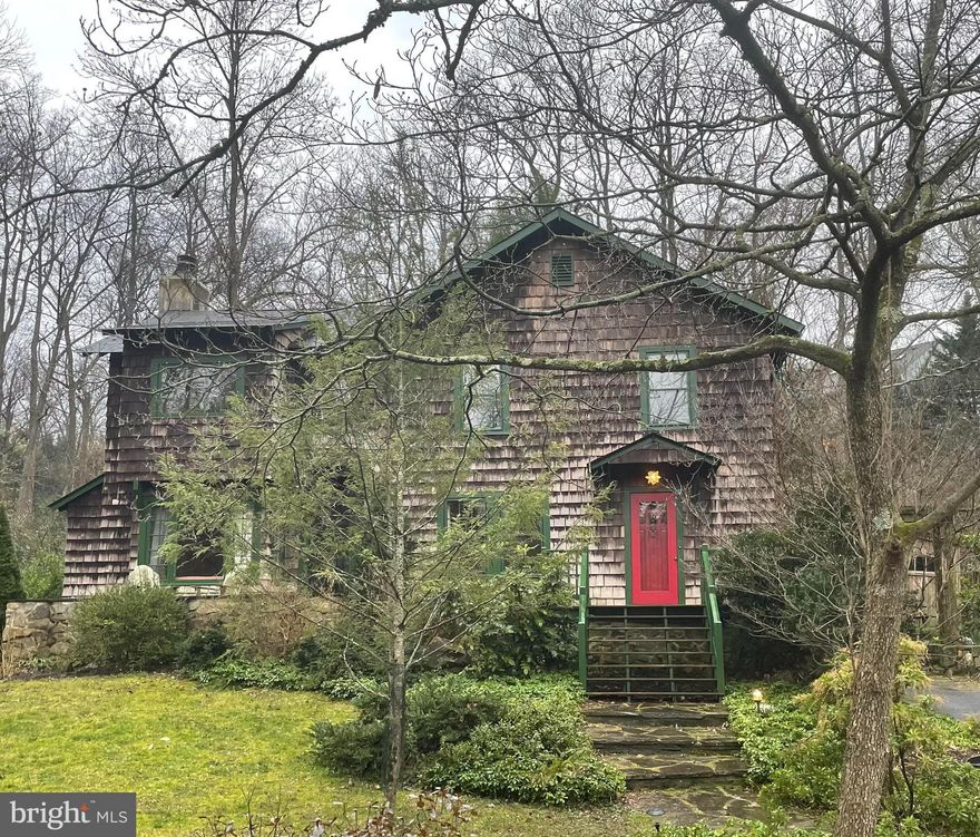 Brimming with charm, this 1921 shake-shingle "cabin in the woods," expanded over time, is truly special.  A small stream running through the front yard with a stone bridge accents a landscape of dogwoods, hollies, magnolias and more across the 13,000+ sf yard. A wooden porch leads into a timeless entry way and foyer (the original parlor), leading to a glorious family room. Two wood-burning fireplaces (one recently relined and recapped) showcase unique old-time charm, along with the spacious, eat-in kitchen, ready for your updates. Dine in the rustic wood-paneled dining room or on the main-level screened porch, overlooking the rear stone patio with fire pit (perfect for intimate gatherings) and the lush back yard. (Yes, the hammock conveys!) Upstairs are four bedrooms, an office and a primary suite sitting room (plus a walk-in closet), as well as a sleeping porch, complete with built-in Murphy bed. A second-floor laundry room and a storage loft provide added convenience. This home is practically a stone's throw to the Mohican community swimming pool. For a $1200 transfer fee, buyers can avoid the $3000 membership fee and jump the years-long waiting list. Ideally located just off MacArthur Blvd, this home is a delightful walk to the C&O Canal, the Potomac River, Glen Echo Park and the friendly Irish Inn. Super-easy access to DC via MacArthur and the Beltway via the Clara Barton Pkwy. Public transportation serving the Friendship Heights metro station is a few blocks away on Massachusetts Ave. Several retail centers with grocery, restaurants and shops are just a few minutes’ drive, as well as three farmer's markets. This location cannot be beat! Easy to show via ShowingTime. House conveys in "as is" condition. RGS Title is the sellers' preferred settlement company.