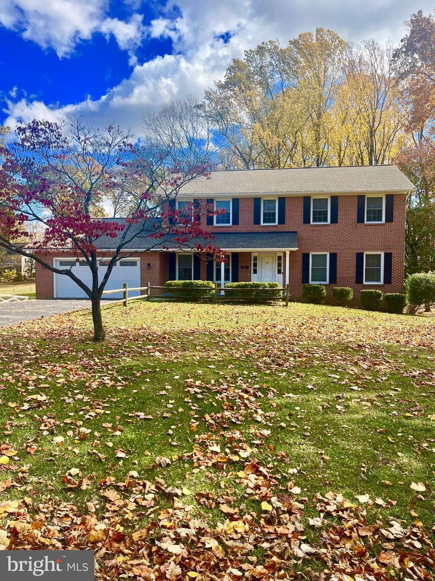 This impressive brick front Colonial in Tuscawilla Hills offers an ideal blend of modern comforts and classic appeal. With five bedrooms and 3.5 baths, this residence is perfectly suited for families seeking both space and functionality.

The home's recent remodels include a new roof (installed in 2017) and energy-efficient windows, enhancing its aesthetic and reducing utility costs. The interior boasts exquisite hardwood and tile flooring throughout, complemented by elegant crown molding and chair rails, which add a sophisticated touch.

In the kitchen, you'll find upgraded granite and Corian countertops, a breakfast bar with a sink, and an abundance of cabinetry featuring self-closing doors and drawers. The kitchen is equipped with high-end GE appliances, making it a chef's dream.

The primary suite is a highlight, showcasing a spacious walk-in closet and a luxurious ensuite bathroom with a walk-in shower, elegantly enclosed by glass doors. The upper-level laundry room is a practical feature, ensuring convenience in daily routines.

The full finished walk-out basement offers versatility, including an in-law suite with a bedroom, walk-in closet, and full bath featuring a beautiful tiled shower. A wood stove adds warmth to this space, while access to a covered patio creates a seamless transition to outdoor living.

Outdoor amenities are equally impressive, with a large Trex deck off the kitchen that overlooks the rear yard, perfect for entertaining. The covered front porch and brick paver driveway further enhance the home’s curb appeal.

Nestled in a sought-after community with a convenience store and fuel station, this property presents a rare opportunity for refined living in a tranquil setting. This home is a perfect example of how thoughtful upgrades and meticulous care can transform a residence into a welcoming sanctuary.