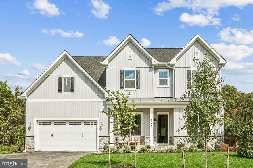 Presenting the Annapolis Builder Model at Summergreen Estates, available now. This beautifully crafted Annapolis floorplan offers an open-concept layout, upscale finishes, and timeless craftsmanship throughout.

The inviting Craftsman-style exterior and spacious two-car front-load garage welcome you. Inside, 10-foot ceilings and 8-foot doors on the main level create a bright, open atmosphere ideal for everyday living.

Highlights include a great room with coffered ceiling and electric fireplace, extended morning room and screened porch, and a gourmet kitchen with expansive island, upgraded cabinetry, quartz countertops, farmhouse sink, stainless steel appliances, and a butler’s pantry with glass-door cabinetry and wine storage. The luxurious primary suite features a California-style spa bath with quartz countertops and elegant finishes. Tray ceilings in the primary suite and dining room, wood shelving, cased windows, and craftsman-style railings add sophistication throughout.

The finished lower level provides additional living space with 9-foot ceilings, a recreation room, media room with raised theater platforms, private den with egress window, and a full bath. 

Set on a wooded homesite in Summergreen Estates, this home offers privacy and convenience close to major routes, shopping, and dining, with no HOA fees. Backed by the Caruso Homes builder warranty, the Annapolis delivers comfort, quality, and peace of mind.