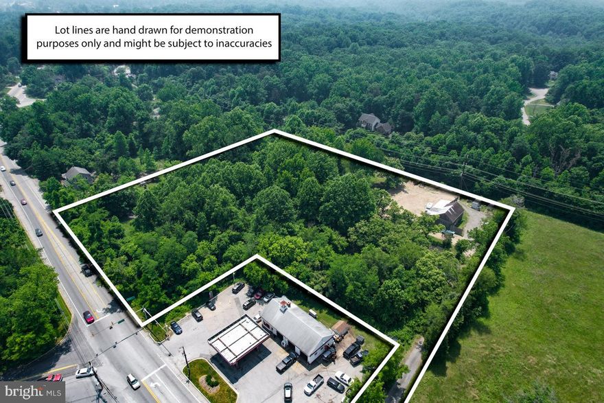 PLEASE DO NOT DRIVE DOWN THE DRIVEWAY OR WALK ON THE PROPERTY WITHOUT A CONFIRMED SHOWING. 

This is a very unique C! zoning, mixed use property situated on 2.77 acres with the rear of the property abutted by the proposed phase 4 B&A  bike trail.

On the property you will find one home with three bedrooms and two bathrooms, along with a spacious detached barn complete with a dual loft, office, kitchenette area and full bath. Additionally, there is a two-bedroom, one-bathroom single-wide mobile home on the property. All three properties are currently rented and separately metered.

The property currently has two septic systems and one well. Buyer to verify current zoning.