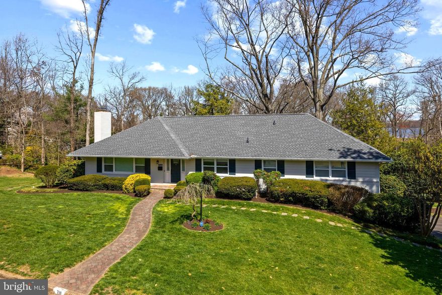 Luxury living with seasonal River Views and 3 car garage!  Owners have just completed an extraordinary renovation and a job opportunity requires them to relocate.  Over 4000 sq. ft. PLUS a walk up attic with cedar closet.  This pristine 5-bedroom, 3-full and 2-half-bath rambler is a testament to timeless elegance, Ideally located between two cul-de-sacs and graced by the presence of the eagles' nest, creating a tranquil oasis. Immerse yourself in the convenience of being mere minutes away from the historic charm of Old Town and the vibrant energy of Washington, DC, accessible via the picturesque George Washington Parkway. 
A host of recent upgrades including a new roof, windows, covered gutters, whole-house generator, baths, interior railing, garage doors, landscaping, and freshly painted interior/ exterior.  Inside, discover a meticulously reconfigured interior with all new lighting, solid core doors and a kitchen has been artfully designed to create an inviting space, complemented by newer appliances and countertops. The reconfigured main level offers room for guests and an expanded powder room. The primary suite has been expanded  and is a spacious retreat, complete with a rejuvenating bath featuring a shower, soaking tub, anti-fog mirrors, and a sprawling walk-in closet and sitting area. The main level guest bedroom suite offers its own sanctuary with a generously sized walk-in closet and a private renovated bath.   
The bright full walk out lower level with windows has a large rec room with fireplace, newly installed Luxury Vinyl Plank and custom bar, another guest suite with  2 bedrooms 1.5 Baths and a storage/laundry room offering endless possibilities for relaxation and entertainment.  Besides a rec room there is plenty of space for a hobby/ play area.
Every detail has been meticulously considered, from the new exterior doors and fixtures to the irrigation system and closet built-ins, ensuring that every aspect of this extraordinary residence exceeds even the loftiest of expectations.