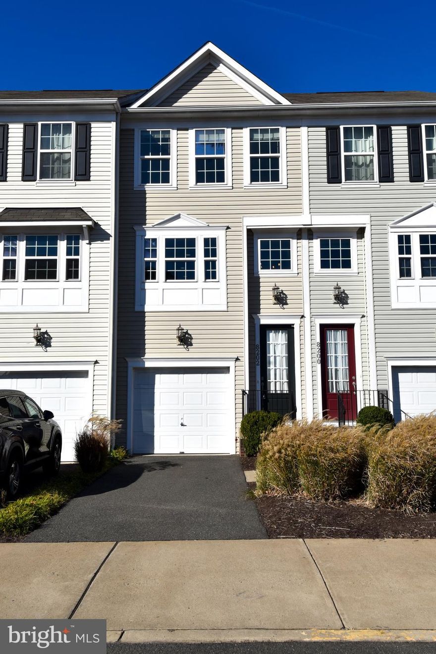 Welcome to this elegant and immaculate, like new townhome,  built in 2015, by Stanley Martin Homes -maintained to perfection by Mr. Clean! This move-in-ready gem features three finished levels, a one-car garage, and is just one unit away from the end of the row, ensuring extra privacy and tranquility.

Step inside to discover a bright, modern floor plan bathed in natural light, thanks to numerous windows throughout. The heart of the home is the chef’s kitchen, boasting exquisite granite countertops, rich cherry cabinetry, and upgraded stainless steel appliances, including a microwave, dishwasher, refrigerator, and stove. Gleaming hardwood floors flow seamlessly through the main level, enhancing the home’s elegance.

The upper level hosts two generous bedrooms, each thoughtfully designed with ample closet space, alongside two full baths for ultimate convenience. The ground floor features an additional bedroom with a large closet, perfect for guests or a home office, plus a utility room and direct access to the garage.

Enjoy outdoor living with a full daylight walkout that leads to a partially fenced yard, backing up to serene trees for added privacy. This home is ideally located close to shopping, restaurants, schools, and easy access to I-66, making it a perfect choice for your active lifestyle.

Don’t miss your chance to own this exceptional home—schedule your visit today! Hurry, this special property won't last long!