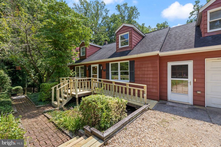 Wonderful storybook cottage priced to sell located in the award winning Severna Park school district. This home is situated on almost an acre and backs to the coveted B&A trail. There is a direct path to the trail for utmost convenience. This home features over 2000 finished square feet and a one car garage. The original owner was a master woodworked and there are custom built ins and trim work  throughout. The main level offers a large living area with custom built ins. The spacious kitchen features a large dining area and incredible sunroom area to take in the wooded views. Additionally the stove, dishwasher and refrigerator have all been replaced. There is a convenient mudroom off the garage and an office with additional built ins. The primary is situated on the main level and features an en suite bath. The upper level features two additional bedrooms each with adorable built in nooks for storage. The lower level features brand new carpet and a large family room and another sunroom that was used as a green house at one point. There is a huge laundry room with tons of storage. There is also a huge workshop that could be converted to a 4th bedroom. Brand new septic was installed in 2015. Additional updates include a new roof in 2017 and new hardwood floors in 2016. If you are looking for acreage and privacy while still enjoying the award winning Severna Park schools, this is the place for you!!!