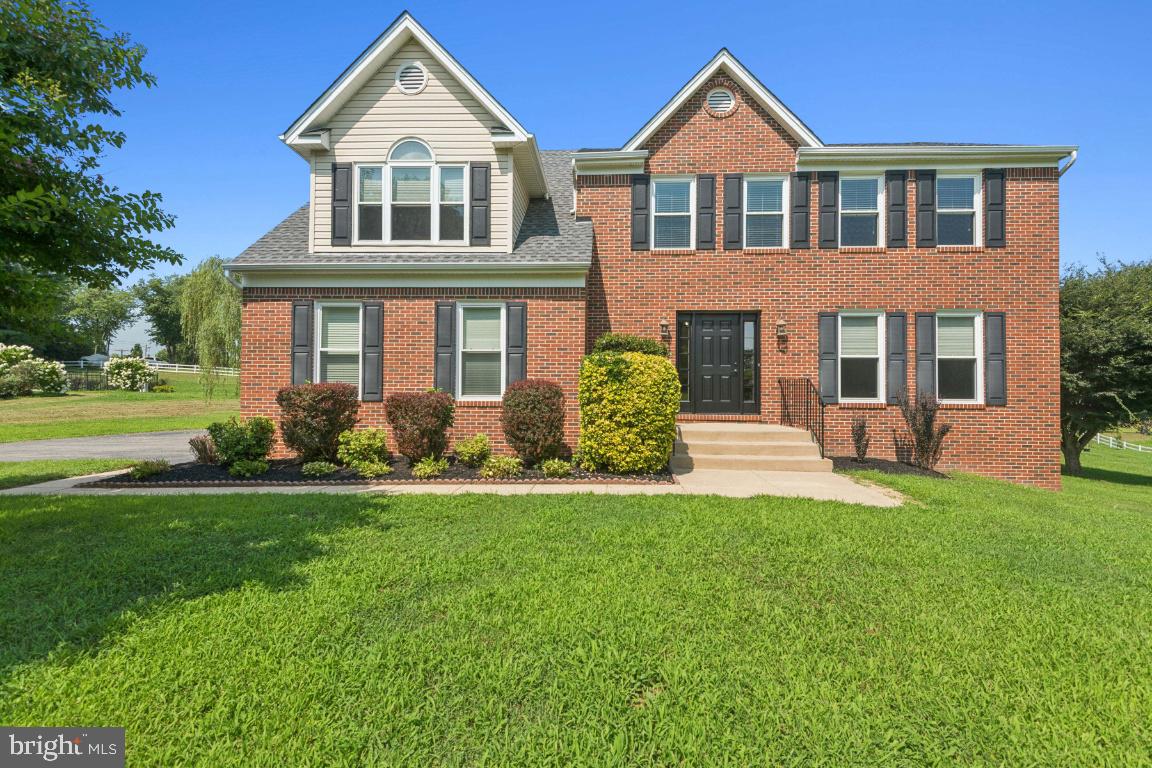 Coming soon is this exceptional brick front Colonial that sits on an almost 1 acre lot in the small and private community of Cox Choice. On the main floor there is an updated kitchen with quartz countertops, stainless steel appliances, tile floor which is open to the family room. You can walk out to the fabulous large screened in porch that has electric for 2 ceiling fans and 6 recessed lights. The porch offers low maintenance trex flooring. In addition, the main floor offers a living room, dining room, half-bath, and large entry way. On the second floor are 3 bedrooms and a primary suite. The expansive primary suite has a cathedral ceiling, hardwood floors, and a quaint sitting room. Attached is a beautifully renovated primary ensuite with a stand alone tub, walk-in shower, and two large separate vanities. A huge walk in closet is off the primary ensuite. The finished basement has an office area, full bath, game room, walk out patio, and an area for storage. The 2 car attached garage provides ample space for vehicles and extra storage, and opens to a long paved driveway for easy parking.