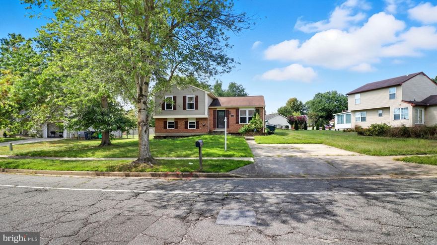 Updated 4-bed, 2.5-bath home featuring a spacious open layout, gleaming hardwood floors, and a modern kitchen with stainless steel appliances. Fresh paint, stylish baths, and generous bedrooms throughout. Enjoy a large backyard with a deck and shed, plus off-street parking. Conveniently located near shops, schools, and commuter routes—move-in ready and waiting for you!