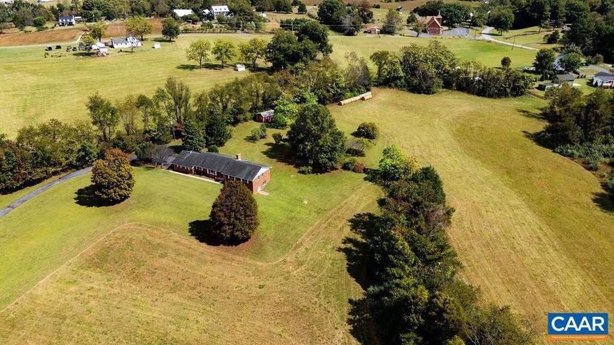Stunning property, Stunning views and Stunning location create the Trifecta for this home.  Perched on a rolling hill with mesmerizing views of Elk Mountain and Humpback Rocks. A premier Afton address along the 151 Trail with easy access to Rt 250 and I 64, whether you are traveling east to Charlottesville or west to the Shenandoah Valley.  This gorgeous acreage has trees and pasture with split zoning encompassing Residential and Agriculture, all with Nelson County taxes. Versatility for every lifestyle with 3 bdrms and 2.5 baths. Traditional designed Ranch with spacious living, dining and family rooms each with hardwood floors. Covered rear porch leads to the drop zone entrance adjacent to the kitchen. Ample room and opportunity with a full unfinished basement. Low maintenance exterior with brick and vinyl allows more time to spend on the your land. Great detached shed to store tools, toys and equipment. Come enjoy a cool fall day and catch the Blue Ridge Mountain glory. Don't wait, make this your home before someone else makes it theirs.,Formica Counter,Wood Cabinets,Fireplace in Family Room