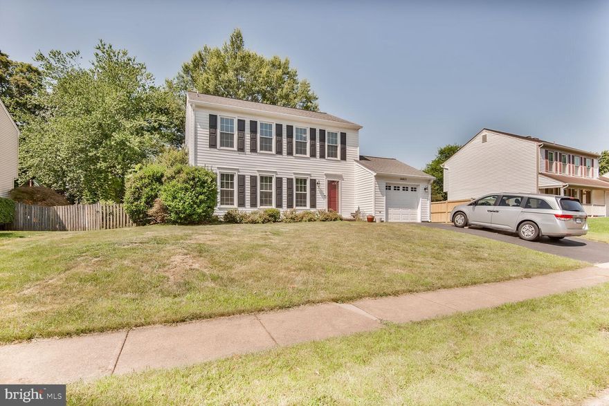 Beautifully updated 4-bedroom, 3.5-bath single-family home offering three finished levels on a private, landscaped lot in sought-after Country Club Manor.

The light-filled main level features gleaming hardwood floors and an inviting living room with recessed lighting and crown molding. A formal dining room showcases elegant details including crown molding, chair rail, shadowbox trim, and updated lighting—perfect for both everyday living and entertaining. The upgraded kitchen is a standout with wood cabinetry, granite countertops, ceramic tile backsplash, stainless steel appliances, pantry, and a center island with breakfast bar and pendant lighting. Sliding glass doors lead to a serene stone patio and fully fenced backyard, creating a seamless indoor-outdoor flow.

Upstairs, the spacious primary suite offers LVP flooring, crown molding, ceiling fan, and two generous closets, along with a beautifully renovated en-suite bath featuring ceramic tile, an updated vanity, and a tub/shower with tile surround. Three additional bedrooms, all with LVP flooring, share an updated full hall bath.

The finished lower level provides a versatile rec room with tile flooring, recessed lighting, ceiling fan, and a stylish wood accent wall. This level also includes a full bath, a flexible bonus room ideal for a guest space, home office, or gym, and a tiled laundry room with front-loading washer and dryer and utility sink.

Enjoy outdoor living in the private backyard with a stone patio, mature trees, and garden space—perfect for relaxing or entertaining. Additional highlights include a one-car garage with automatic opener and extra storage.

Ideally located near shopping, dining, major commuter routes including I-66, Routes 28 and 50, Dulles International Airport, and major employment centers.