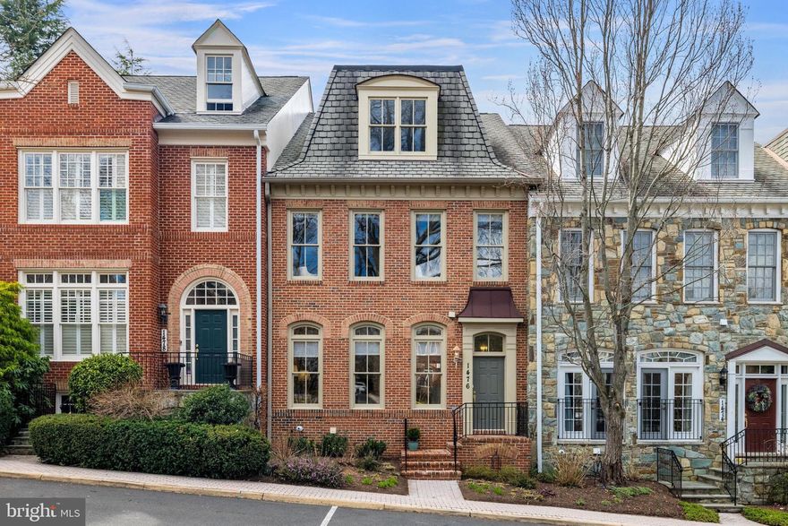 This elegant Mayhurst model with elevator and two-car garage in the gated award-winning community of Evans Farm features over 4500+- sqft of living space on 4 levels. The main level features extensive architectural details and extensive millwork, 10ft ceilings and is bathed in natural light. Recently painted with designer light fixtures, this home is full of quality finishes and gracious spaces. A 12-foot foyer welcomes guests and the formal living room and dining room are alongside a generously sized chef’s kitchen with viking range, pantry and breakfast room, a cozy family room with gas fireplace and built-ins. Two walls of windows open to the private and meticulously maintained Georgetown patio. A formal powder room rounds out the main level.

Two upper levels with 3 bedrooms and open loft area with bathroom provide ample room for family and guests. The primary bedroom suite features a large sitting area, a walk-in closet, tray ceiling, and a spacious bath with dual sinks, vanity, separate water closet, soaking tub and shower. Two additional bedrooms with a shared bath and a laundry room complete the 3rd level. The loft level has a large open room and adjoining full bath, perfect for a 4th BR or library.

The lower level features a large recreation room, additional storage, ample added closet space, and bonus room with full-bathroom.

Evans Farm provides for low-maintenance living. Just lock and leave due to the added security and privacy of a gated community! No yard work necessary, yet still have access to walkable, beautiful grounds, the original Evans Farm Pond, water mill and stone house (now the community room). Location is tremendous! Conveniently located just inside the beltway, close to commuter routes (123, 66 & 495, GW Parkway) and the silver line metro (just a mile away). Fantastic proximity to Tysons and downtown McLean for shopping, dining and everyday needs. Do not miss this wonderful, quintessential Evans Farm home.

The HOA Association maintains the common areas - the roads, gate, mill house, pond near the mill house and stone house.  Grounds maintenance, trash and snow removal are included