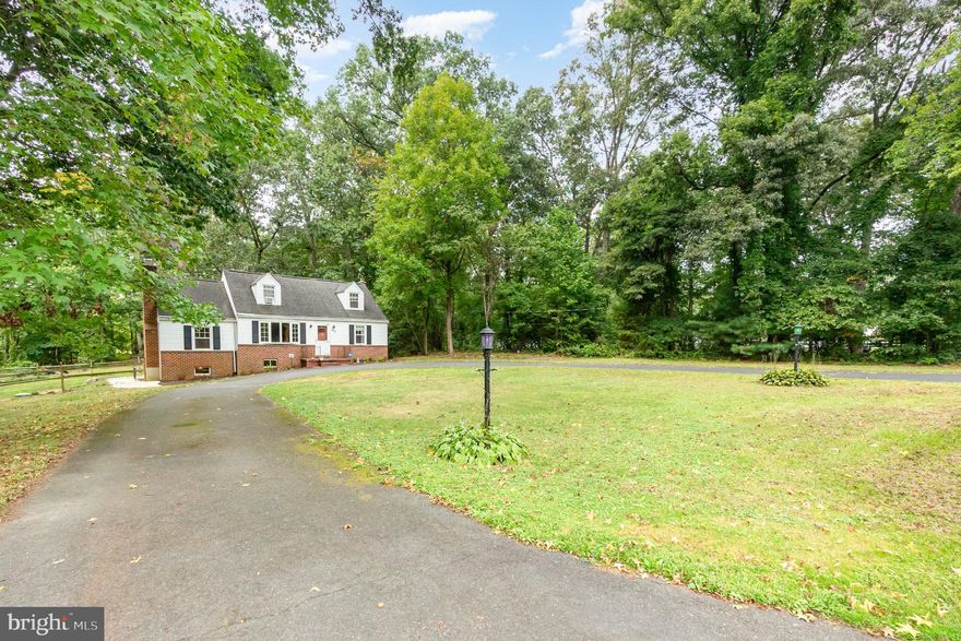 Classic Cape Cod on .94 acres!!  Serene country setting! No HOA! First floor living room, family room with fireplace, kitchen with center island, and Master Suite with attached full bathroom and oversized soaking tub. Full bathroom in hallway. Upstairs, two additional bedrooms and a full bath. Spacious basement with shop and club room. Living room, dining room, kitchen, and both upstairs bedrooms freshly painted! Main level bath new vinyl flooring and bean board. Furnace approx 2016, water heater approx 2018, A/C approx 2018. Brick patio and fenced rear yard. Recent BAT septic system! Fresh landscaping! As-Is Sale.