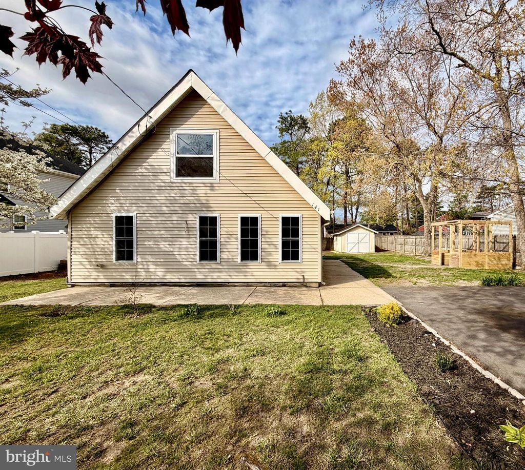 Photo of 141 Bowsprit Road, MANAHAWKIN, NJ 08050 (MLS # NJOC2041862)