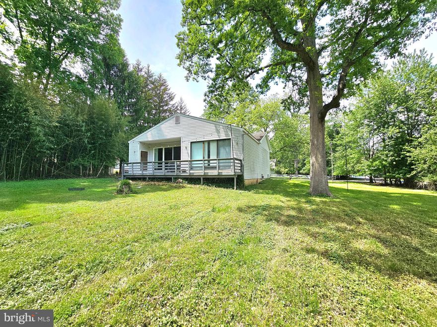 AVAILABLE AFTER JUNE 1st.  Welcome to this custom designed two-bedroom, two-bathroom home, ideally situated in a highly sought-after location. Set on a generously sized, lushly landscaped lot, this property offers the perfect blend of indoor comfort and outdoor living.

Step into the sun-lit living room featuring vaulted ceilings and a decorative (non-functional) fireplace that adds charm and character. The open-concept kitchen and dining area boast rich hardwood floors and ample space for entertaining, with a seamless walkout to a stunning, full-length back deck — ideal for al fresco dining or simply relaxing in the serene surroundings.

The spacious family room just off the kitchen provides additional room to gather or unwind. Both bedrooms feature their own private ensuite baths, offering privacy and convenience. The rear bedroom suite enjoys direct access to the back deck, creating a peaceful retreat with a view.

The full basement includes a washer and dryer and offers a massive storage area—perfect for all your seasonal and extra belongings.

With its unbeatable location, spacious layout, and inviting outdoor space, this home is a rare gem that combines comfort, style, and practicality.

Up to two dogs less than 50 lbs each accepted with some breeds restriction. No cats.