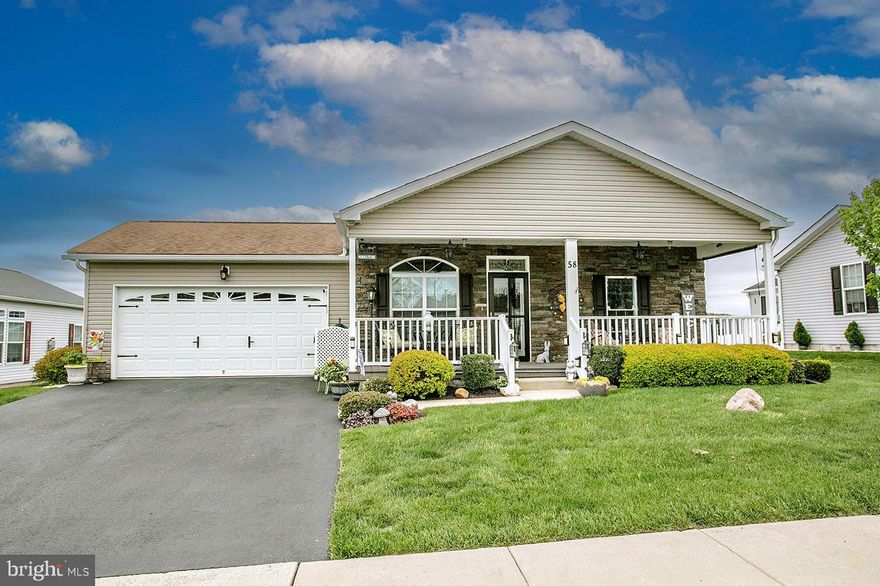 Great opportunity to own this well loved and cared for home located in convenient Douglas Village. These original owners put thousands of dollars in upgrades and improvement, too numerous to list. Enter the home from the covered front porch which is highlighted with ceiling fans and LED lights that you can change the color for the season, or your mood. Enter into the formal dining room , or possible formal living room that features  9  foot ceilings and recessed lighting. There is an arched entry with half columns that separate this room from the open Kitchen, dining area and family room.  The family room has a gas fireplace. The kitchen has many upgrades such as the cabinets, recessed lights and Corian countertops with matching island. Off the kitchen is a nice sized laundry room .  A sliding glass door in the dining area leads to a vinyl deck and railings and step down patio with block pizza oven / fireplace.  The main bedroom has a tray ceiling with a ceiling fan , There's a walk in closet and full bath with whirlpool tub and linen closet. The other 2 bedrooms also have nice closet space and ceiling fans. there is a hall bath for guests that has a walk in shower. The home features low maintenance exterior and tilt single hung windows plus the owners are offering a One Year Home Warranty with the purchase. This community does not have a homeowners association but does have rules and regulations and the ground rent includes mowing, weed wacking, snow plowing of the roads and public walkways, weekly trash removal, access to the club house, pool, library and gym. The sewer and water gets billed through Douglas Village