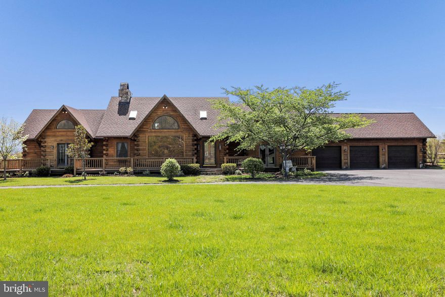 Once in a lifetime opportunity to own this magnificent Appalachian Log home on nearly 250 acres of the most pristine land you will find in Wild and Wonderful, West Virginia. You will be in Almost Heaven when you arrive through the gates of this grand estate and proceed along the fully paved, circular drive that has room for as many cars, buses, or trailers as you would need to accommodate. In addition to the main house there is an attached three bay 23' x 35' garage, 9 stall horse barn with 14 fenced acre pasture, 30' x 60' pole barn with walk-in freezer and wood shop, 2 ponds, saltwater pool 30’ x 50’ and 11 ½ deep at diving board end. Home features post and beam construction.  Log and stone abound in this luxurious home with soaring ceilings in the great room accented by one of two floor-to-ceiling stone fireplaces. Flooded with natural light from the large windows and several skylights, the rich wood interiors really shine through. The kitchen has a quaint old style modern stove plus griddle built into the island breakfast bar.  The dining room is across from the kitchen and easily seats 20 guests.  There is a breakfast area for more intimate seating option.  Several decks on multiple levels provide quiet respites or spectacular entertaining spaces overlooking your stunning valley and mountain views. Bring the horses, hunt on your private acreage, host retreats, fish, wander, enjoy nature or hobbies. There are over 4 miles of easy access roads that traverse the woods and meadows, along the stream on the property and rolling hills. Spy a bald eagle soaring as they frequently do above the property.  Many properties claim to offer endless possibilities – this one delivers!  Located 2 1/4 hours from Dulles (IAD) in Virginia, 2 1/2 hours to D.C., Baltimore, and Pittsburgh, 4 hours to Philadelphia. Cumberland Regional Airport is 30 minutes away, Rocky Gap Casino and Resort is 25 miles away. Property is serviced by Xfinity. Don't miss out on this remarkable find!
