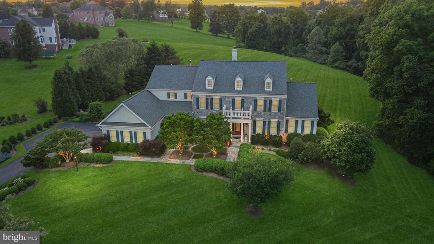 Tucked away in the serene Shenstone subdivision, this beautiful stone colonial offers a perfect blend of elegance and privacy. This expanded "Coventry" model features 4 spacious bedrooms each with a private full bathroom and is situated on a private lot adjacent to a picturesque creek, providing a tranquil setting. The rear paver patio is ideal for outdoor entertaining, while the extensive landscaping with custom two-zone LED lighting enhances the home's exterior appeal. A flagstone walkway and front porch set the stage for what’s inside.

The main level boasts a two-story foyer with marble floors and wide plank hardwood floors throughout. Crown molding and chair rail adorn the foyer, living room, and dining rooms. The library features custom built-in shelves, and the expanded family room offers a floor-to-ceiling stone gas fireplace and a home theatre system with surround sound. The gourmet kitchen, with its large center island, is perfect for entertaining. An audio system on the main level includes speakers in the kitchen, family room, and conservatory.

The upper level features an expanded luxury primary suite with a sitting room and a private attached bathroom. Each of the 3 junior suites feature their own private full bathroom.

The full unfinished walk-up basement comes with plans available for finishing upon request.   Plans for a pool are also available upon request.

All three levels feature 9-foot ceilings, adding to the spacious feel of the home.

Some of the recent updates include a new hot water heater (2023), a new roof, gutters, downspouts, leaf guards, and window screens (2022), a new water treatment system (May 2024), a new water softener (2020), top-of-the-line multi-stage Carrier HVAC systems (2018).

This stunning property combines exquisite interior spaces with serene outdoor living, making it a rare find in the Shenstone subdivision.