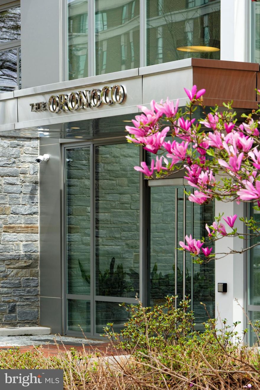 Luxurious one level living in this stunning 3 BR 2.5 BA condo with river view from 2 terraces.  High ceilings, floor to ceiling windows, chef's kitchen with integrated appliance cabinetry for Bosch,Wolf,Subzero, quartz counter tops.  Handsome hardwood floors, spa-like bathrooms, two master walk-in closets and indoor/outdoor gas fireplace.  3 garage parking spaces.