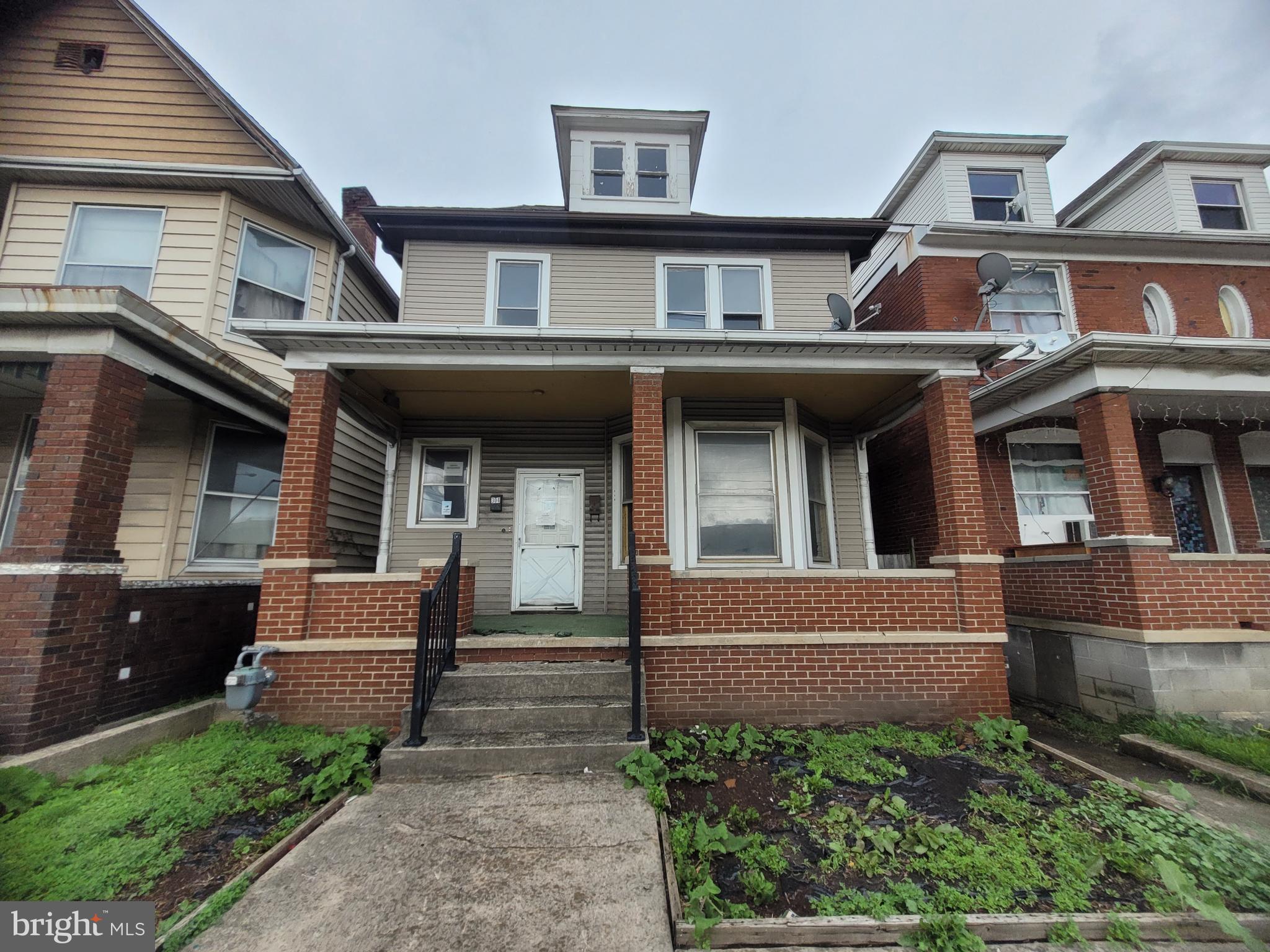 This charming detached residence, built in 1911, offers a unique blend of transitional architectural style and modern potential. With 1,764 square feet of living space, this home presents an excellent opportunity for customization and personal expression. The unfinished basement provides ample storage or the possibility for future expansion, catering to a variety of lifestyle needs. Situated on a manageable 0.06-acre lot, this property allows for easy maintenance while still providing outdoor space for relaxation or gardening. On-street parking ensures convenience for residents and guests alike. The property offers a straightforward investment opportunity in a desirable location. Embrace the potential of this residence and transform it into your dream home.