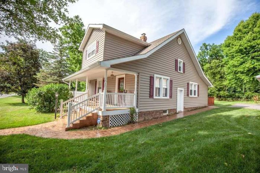 Charming cape cod style home with 3 bedrooms and 2 full baths on 1 1/4 acres. This home has been updated throughout the years to include: Kitchen - cabinetry, black granite countertops, black stainless steel electric appliances, crown molding and tile flooring. The foyer, living room and formal dining room has refinished hardwood flooring, chair rail / crown molding. The living room has a gas heating fireplace with brick surround. The first floor also includes one full bath with pedestal sink and shower stall, the laundry area with built in storage closets and the "L" shaped staircase leading from the foyer to the second level. The second floor includes 3 bedrooms and full bath with tub/shower, new sink and vinyl flooring. The paint and electrical fixtures throughout the house have been updated as well. The entire first floor boasts 9'+ ceilings. The unfinished basement is partial crawl space and open area that can be accessed through the exterior or kitchen doors. The exterior has been updated with siding, architectural shingles, stamped concrete sidewalk and steps. The paved driveway leads to the oversized 30x30 detached two car garage. There is also a 10x12 outdoor building for storage. Both HVAC units have been updated (2 zone). Partial electric base board heat as well. This property backs up to the USGS (Fish Hatchery) property. **Buyer pays Transfer Stamps. Agent is owner.