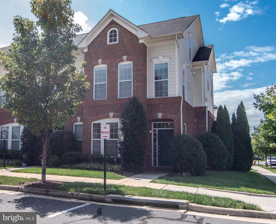 Absolutely stunning end unit townhome in sought after Landsdowne Town Center. This luxurious home boasts top to bottom upgrades. Enter through the inviting foyer opening to well appointed formal living room and dining room with extensive moldings, Recessed lights galore through out the house when this home is blessed with abundant natural lights already. Gleaming wood floors leads you to 2 story family room with floor to ceiling stacked stone facade wall w/fire place, stacked windows w custom draperies.  Gourmet kitchen with top of the line appliances and upgraded cabinetry,  Granite counter top. Luxurious oak stairs with wrought iron banisters takes you to upstairs where spacious rooms and lux baths. All closets have custom built ins, Huge master bedroom has a loft space where you can retreat or make it into an office. Master bath has separate shower and deep tub, Second staircase will take you to a graciously spaced bedroom and full bath for a unique private area. Full fenced in backyard with concrete patio for outdoor fun. Hop on to Route 7, Dulles toll road, Rt 28, Dulles airport. One loudoun, Walk down the street to be in the middle of town center to enjoy your day or evening! Water heater replaced 2015, HVAC replaced 2018