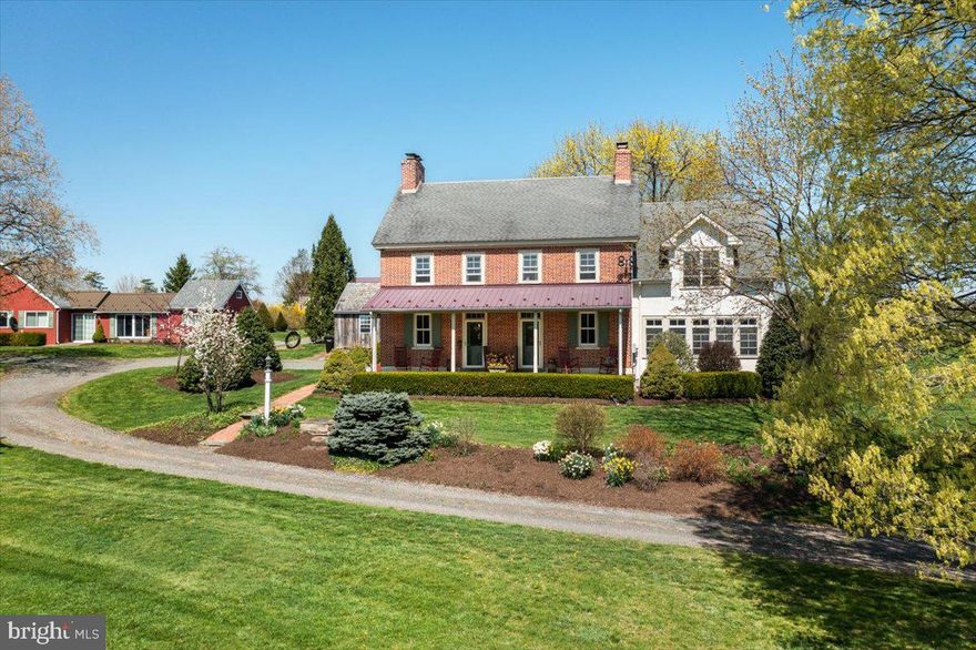 An idyllic country setting surrounds this 47+ acre Gentleman’s Farm nestled between the steeples of 2 churches on Dark Hollow Road. The property consists of a historic brick farmhouse, a smokehouse, a 2-unit carriage house, bank barn, chicken coop, a pole barn, 9 acres of fenced pastures, 3 acres Christmas tree plantation, and 25 acres of hayfields. Family-owned since 1977, pride of ownership is evident in the thoughtful updates and exceptional maintenance throughout. Consideration for current uses in addition to future needs went into every aspect of the planning and layout for this farm. Whether the new owner is looking for an operational business or seeks pure enjoyment on these bucolic grounds, the choices are here. This one-of-a-kind historic home has been completely re-pointed, had a new septic system installed, and offers incredible views. Dating back to 1800, the comfortable 4 bedroom 3 full bath farmhouse has 4 working fireplaces, including the walk-in fireplace in the keeping room. The conservatory-type sunroom/family room was part of an addition in 2008 by Reshetar and is filled with light and panoramic views. A Jarrett Vaughan renovation opened the farmhouse kitchen into the dining room that offers pastoral views. Both the mud room with a handy utility tub and the separate laundry room have outside access, and a full bathroom is conveniently located nearby. Original spiral staircases along with the modern turned staircase lead to the 2nd level where random width Pumpkin pine floors and surprisingly high ceilings with exposed beams continue. The Master Bedroom Suite was built over the conservatory during the 2008 construction and offers a vaulted ceiling, walk-in closet and extra closet space, window seating with storage, and full bathroom. 3 additional bedrooms are nicely sized, have fireplaces and share a full bathroom. Spiral stairs lead up to the 3rd floor/attic with a cedar closet. The electric panel has a transfer switch to accommodate a generator in case of inclement weather. Keeping the home heated is economical and efficient with the wood boiler heating, or use the traditional oil burner. 4-zoned air conditioning keeps everyone comfortable during the summer. A covered front porch and well-maintained bluestone/brick back patio with a stone wall offer respite from chores and peaceful spaces to enjoy the professionally designed landscaping. The smokehouse presents many flexible options to use as an office, party/game room, or art studio. The carriage house has served as 2 separate rental units for decades. Each unit has 1 bedroom, a full bathroom, a living room, full kitchen, laundry, electric heat, wood stove, and separate parking. The pole barn (60’ x 40’ x 12’ tall) features a regular access door, 2 large sliding doors, and 1 large overhead door. The renovated bank barn with beautiful Pennsylvania stone foundation features a covered loafing porch with 5 Dutch doors with the potential for a total of 7 stalls on the 1st floor. Most auxiliary buildings have electricity and water. The owners have blended the old with the new in this unique restoration of the past. From one of the many vantage points on the property, sweeping views of the rolling Bucks County countryside may be captured. Act 319 - an Agricultural Land Preservation Easement. Subdivision possibility. Located within a few miles radius of countless golf courses, parks and recreation. Only a 20 minute drive into Historic Doylestown or New Hope with boutiques, restaurants, museums and cultural events. Commute to New York or Philadelphia easily from this terrific location! This home is part of the Palisades School District with many prestigious private schools in the area as well. Conveniently located minutes from Route 611, with easy access to Route 202 and other major commuter routes. Unique and special opportunity - call today!  Also see MLS#  PABU2047978 Farm