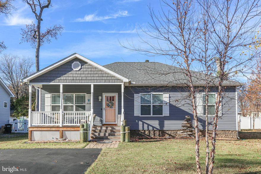 Introducing The Thomas II: a thoughtfully designed home offering 1,408 sq. ft. of optimized living space. This home features an open floor plan with abundant storage and modern touches throughout. Enjoy a dedicated dining area, a utility room with a sink, washer/dryer, and closet shelving. The interior is elevated with two-tone paint, crown molding, upgraded doors, lighting, and ceiling fixtures.

The kitchen is a true highlight with stainless steel appliances, granite countertops, a built-in microwave, a side-by-side refrigerator, and custom cabinetry with crown molding. The living, kitchen, and dining areas boast upgraded luxury vinyl plank (LVP) flooring, while the three spacious bedrooms are carpeted for comfort. Both full bathrooms feature tub/shower combos, and the primary suite includes a walk-in closet.

Step outside to enjoy a 114 sq. ft. front porch, a 160 sq. ft. back screened in deck, and a  fenced yard for added privacy. The detached oversized single-car garage  with a patio enhance the outdoor experience.

Located just one block from the Potomac River in the sought-after water access community of Colonial Beach, VA, this home, built in 2020, is practically brand new. Don’t miss this opportunity to own a beautifully maintained, move-in ready home near the water!