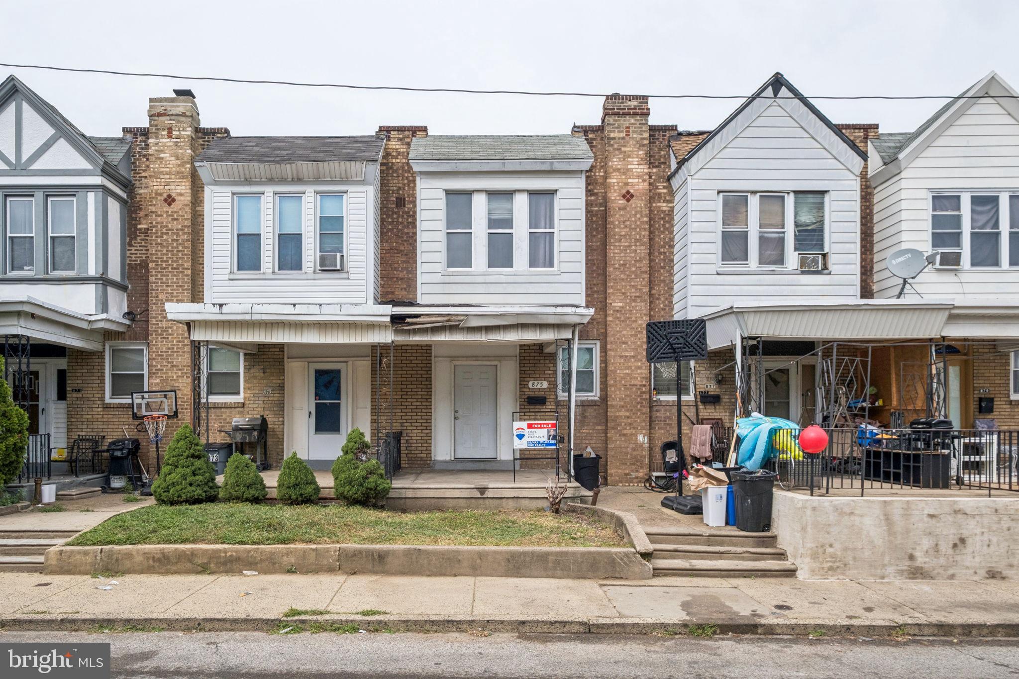 Welcome to 875 Granite Street: a traditional, straight through row home located in northeast Philadelphia.
Approaching this property, you will see a quaint green space and a front covered porch with a concrete stamped patio. Enter through to a rather spacious living room, a formal dining room, and a kitchen in the very back. The kitchen offers just the right amount of space for all of your cooking and storage needs, entertaining, and easy access to and from the shared deck. Completing the first floor is a half bathroom in the dining dining room. Upstairs, you will discover three bedrooms, including the large front facing master bedroom. Each bedroom has enough space for his and her belongings and or closet space. Shared amongst the bedrooms is one full bathroom. Downstairs is a full-size basement with access to the garage. Customize this space for all of your storage needs and/or potential finishing for extra living space. This property is a stone throw away from the Roosevelt Boulevard, with quick and easy access to all of Center City, Philadelphia as well as a short commute to surrounding counties. Consider adding seeing 875 Granite Street to your list of properties today!