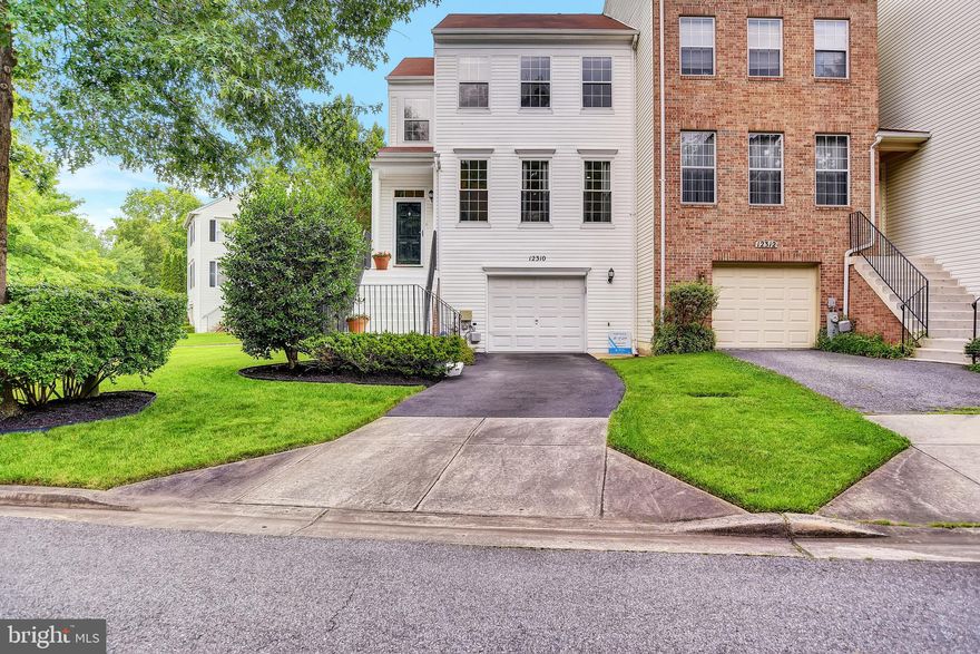 GORGEOUS -- Well Maintained is an Under Statement -- Move In  Ready End Unit Townhome in the Sought After Northridge Community of Bowie -- Upon Walking In You will be Greeted With Beautiful Cherry Hardwood Floors With a Large Living Space Perfect For Entertaining Family & Friends -- The Living Space Features a Formal Dining Area that Continues back to the Elegant Kitchen Where the Entertaining Does Not Stop  With a Walk Out Deck and a Private Location With Woods Backing Up to the Property -- This Back Yard  Also Features a Patio Below the Deck That Walks Into the Finished Lower Level Living Space -- The Lower Level is An Added Bonus With Tons of Space Used as an Additional Family/Gaming Room, Personal Office Or Further Entertaining Family & Friends -- The Upstairs Level Will Feature Two Large Secondary Bedrooms With California Closets -- a Primary Bedroom and Bathroom That Speaks For Itself -- This Townhome Offers Great Space for You and Your Family to Live & Grow in Over the Years With Stress Free Parking in Your Personal Garage -- Plenty of Driveway Space And an Abundance of Community Parking --  Easy Access to D.C. Metro Lines, Bus Service, Shopping, All Major Routes.