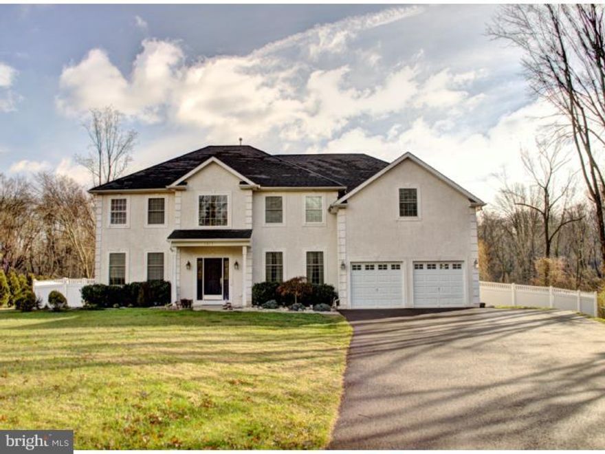 Stunning colonial on quiet street in Montgomery Township.  An inviting 2-story foyer with turned oak staircase welcomes you into this home.  Beautiful hardwood floors extend throughout the first floor (except in the kitchen and mudroom).  The gourmet kitchen features cherry cabinetry, granite counters, ceramic tile floor and backsplash, and stainless steel appliances.  A convenient mud-room is located just off of the kitchen.  The 2-story family room has elegant fireplace, large windows, sliding glass doors to the rear yard, and an adjacent study with French doors and crown moulding.  A dining room with trayed ceiling, a nicely appointed living room, and a full bath round out the main floor.  Upstairs, the master bedroom boasts a sitting room, trayed ceiling, three walk-in closets, and a master bath with soaking tub, ceramic tile shower, and double vanity.  Three other nicely sized bedrooms and a large hall bath complete the 2nd floor. Full basement, 2-car garage, and rear yard enclosed with maintenance-free privacy fencing.