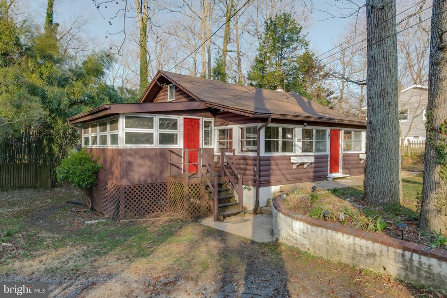 LOCATED ON A BEAUTIFUL, WIDE, LANDSCAPED LOT WITH CIRCULAR DRIVEWAY--OPEN LIVING/DINING ROOM--ENCLOSED PORCH W/  HEAT FOR EXTRA LIVING SPACE (NOT INCL IN TOTAL FIN SF ON TAX REC)--2ND ENCLOSED PORCH AT ENTRANCE--ROOF 2018--BASEMENT/CELLAR WITH OUTSIDE ENTRANCE FOR EXTRA STORAGE/UTILITIES--14x16 SHED IS GREAT FOR WATER TOYS--ONE BLOCK TO THE WATER--MULTIPLE MARINAS, BEACHES, BOAT RAMPS, PLAYGROUNDS