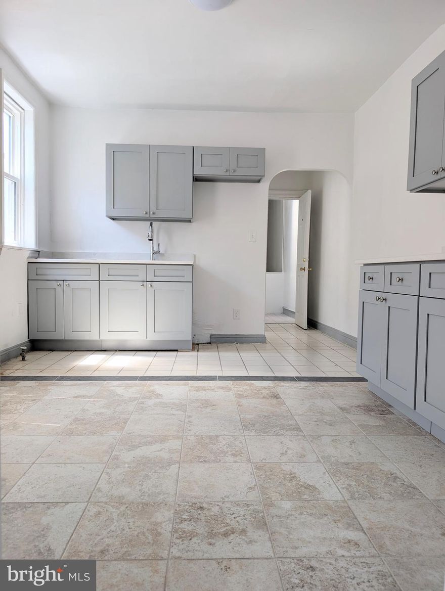 This spacious 1-bedroom, 1-bath apartment has been beautifully renovated with modern finishes throughout. The stunning kitchen is perfect for cooking and entertaining, while the large windows bring in soaking natural sunlight, making the space feel open and airy. Walk Score of 91 made everyday errands are easy to run without the need for a car.  Walking distance to Fox Chase Line at the Olney station!