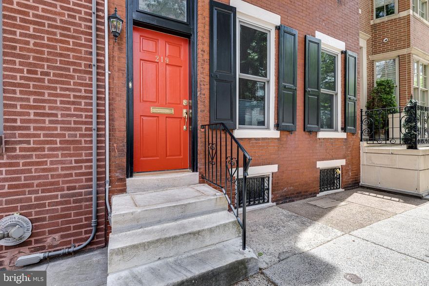 219 S. 24th Street in Fitler Square is a truly special home and is now available for sale.  This handsome and historic 19-foot-wide residence offers over 2,500 square feet of completely updated living space with 4 bedrooms, 3.5 bathrooms, a finished lower level and fantastic finishes with an amazing attention to detail throughout.  The large open Living and Dining Rooms are just off of the front entry vestibule and have high ceilings, warm hardwood floors and feature a custom floating bamboo shelving unit that steals the show and seamlessly combines the two spaces.  Just beyond is the bright eat in kitchen featuring Maistri italian cabinets, stainless steel counter tops, custom-built stainless-steel table for added prep or eating space.  Liebherr refrigerator, Miele convection and steam ovens, stove top and dishwasher along w/a brand-new Faber tube cooktop exhaust.  There's also a large coat closet and efficiently placed powder room.  Custom German engineered doors take you from either the dining area or kitchen to the sweet, private, blue stone patio in the back perfectly blending indoor/outdoor living, offering room for container gardening, dining and entertaining all under the large wood trellis w/climbing hydrangeas and plantings.  2nd level features 2 large bedrooms, a library/den/office area and full hall bathroom. 3rd floor showcases the immense Primary suite w/stainless steel railing, exposed brick and a large seating/family room, separated with custom glass and steel sliding doors to the sleeping space.  In addition, there is a 'garden' room w/tiled floor and walls and exposed wood ceiling beams.  The primary bathroom has italian and spanish tile, toto toilet and glass shower w/Hans Grohe fixtures and a smart combo LG washer/dryer.  Fully finished lower level offers an additional bedroom space, currently set up as family/media/playroom with floor to ceiling oak built-in's and has a full bathroom. large custom closet and separate laundry room w/hook-ups and utility sink.  Location is Triple A+, just a short walk to Penn and Drexel, super close to numerous shopping/grocery stores, great restaurants, dog parks, and Schuylkill River Park and trails, Located in the Greenfield School catchment and just steps to Rittenhouse Square.  Seller offering 2 years paid parking at 140 S 24th Street, secure gated lot less than 1 block away.