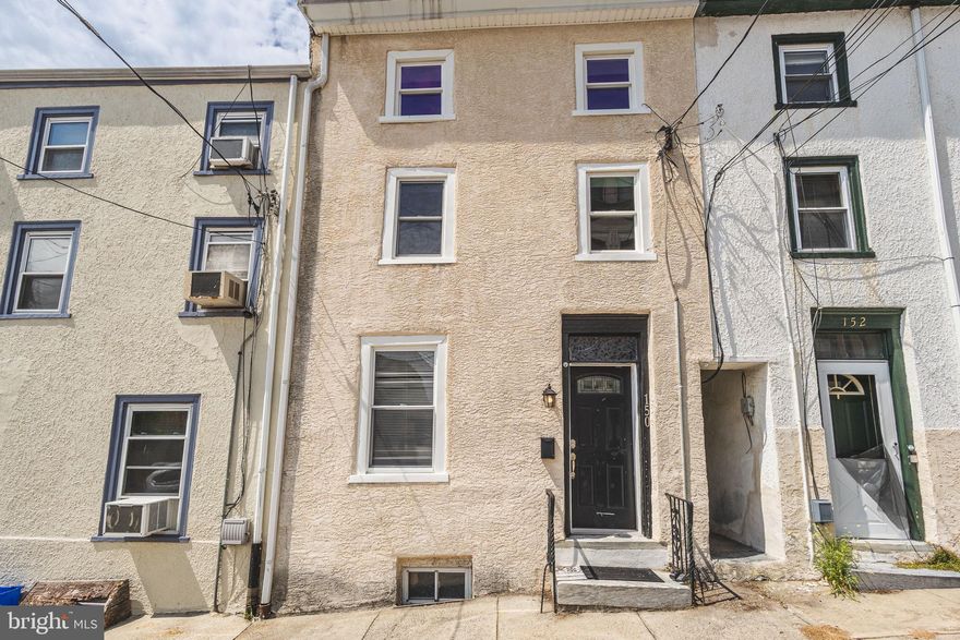 Spacious home on a great location in Manayunk.  Enter into a bright living room/dining room area with wood floors.  The kitchen has great views into the backyard.  With a deep lot, this backyard has plenty of space for sitting and relaxing or for gardening.  The 2nd floor contains an extra large bathroom, the primary bedroom and a 2nd bedroom.  2 more bedrooms are located on the 3rd floor.  And laundry and storage are located in the full, dry basement.  Just 2 blocks from Main Street and the Manayunk/Norristown Regional Rail Line, make it a super convenient home.  Needs some TLC, but could make a great home!