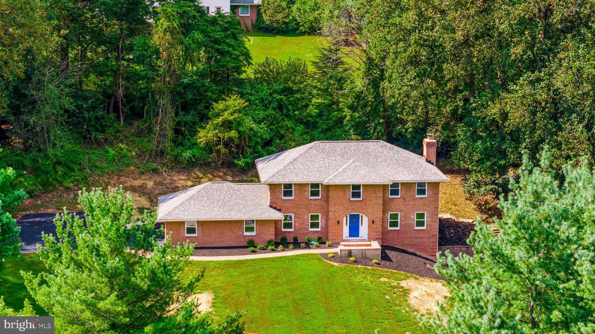Washer/Dryer included and being installed! Welcome to this beautifully reimagined brick colonial, set on just under 2 private acres in one of Hunt Valley’s most sought-after communities. Completely updated from top to bottom, this home blends timeless architecture with modern design and comfort.
Step into the gourmet kitchen, featuring sleek quartz countertops, custom oak wood cabinetry with exceptional storage, and an effortless flow into the dining room — ideal for family meals or entertaining guests. The oversized living room offers an inviting space to gather, while the main level also includes a versatile home office/flex room and a stylish half bath.
Upstairs, the primary suite serves as a private retreat, complete with a spacious walk-in closet, a vanity area, and a fully updated spa-like bath with a freestanding soaking tub and glass-enclosed shower. Three additional large bedrooms and a hallway bath with dual vanities provide both function and style.
The fully finished basement expands the home’s living space with a full bath, oversized multipurpose room, and sliding-door walkout to the backyard. Outside, enjoy a stone patio, expansive lawn, and serene setting — perfect for entertaining or quiet evenings.
Major updates include new windows and water heater for peace of mind.
This home offers a rare combination of privacy, space, and a prime Hunt Valley location.