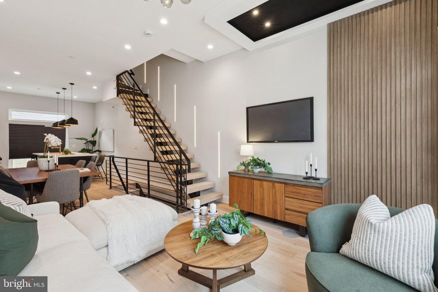 Welcome to your dream home in the heart of Point Breeze, Philadelphia! This stunning new construction offers the perfect blend of modern sophistication and timeless charm. As you step inside, you will be greeted by a spacious and open floor plan that is flooded with natural light. The main level features a beautifully designed gourmet kitchen, complete with high-end stainless steel appliances, quartz counter tops, and ample storage space. The kitchen seamlessly flows into the elegant dining area, creating the ideal space for entertaining family and friends. The living area is the epitome of comfort and style, boasting large windows that showcase the picturesque views of the neighborhood. This space is perfect for relaxing after a long day or hosting gatherings for loved ones. Upstairs, you will find a luxurious main suite that is a true retreat. The master bedroom offers a tranquil oasis with a walk-in closet and a spa-like ensuite bathroom, complete with a soaking tub, dual vanities, and a spacious shower. Three additional bedrooms and two full bathrooms provide plenty of space for your family or guests. This home also features a private rooftop deck, where you can enjoy breathtaking city views and create lasting memories with loved ones. It is the perfect spot for summer barbecues, stargazing, or simply unwinding after a busy day. In addition to its impeccable interior, this new construction offers a prime location in the highly sought-after Point Breeze neighborhood. Property comes with a 10yr tax abatement