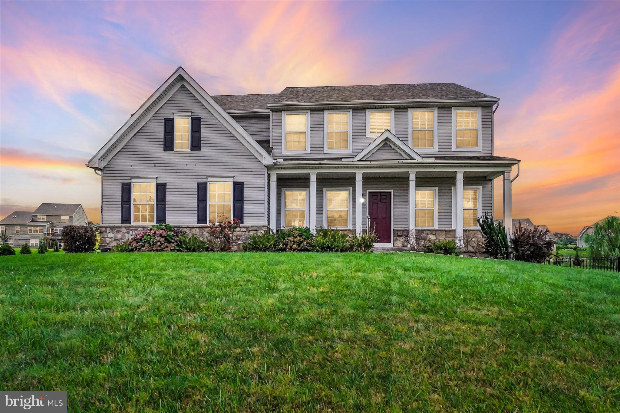 Welcome to this spacious and beautifully appointed 4-bedroom, 2.5-bath Colonial located in the desirable sidewalk community of Hamilton's Overlook. Situated on a generous and level .60-acre lot, this home offers over 3,100 square feet of finished living space and is thoughtfully designed for modern living.
Step inside to find luxury vinyl flooring throughout the main level, a stylish drop zone area off the mud room and a well-equipped kitchen featuring quartz countertops, a prep island with pendant lighting, desirable gas cooking, and a full walk-in pantry. The formal dining room and first-floor office add flexibility for both entertaining and working from home. A cozy gas fireplace anchors the inviting family room.
Upstairs, the expansive primary suite boasts a trey ceiling, dual walk-in closets, and a luxurious Roman-style bath complete with soaking tub, separate tile shower, and double vanities. Three additional bedrooms offer ample space for family or guests. No lugging laundry upstairs, convenience-focused laundry room is well placed at the end of the hall. The partially finished basement includes a rec room and is already roughed in for a future full bath—offering endless potential for customization. Enjoy outdoor living on the large, low-maintenance composite deck—perfect for relaxing or entertaining—overlooking the expansive, level backyard.
The oversized side-entry two-car garage includes a convenient storage area perfect for lawn equipment, bikes, or outdoor toys. The home is Ideally located just minutes from I-83 for an easy commute, this home is also close to the Heritage Rail Trail—perfect for walking, running, or biking. Enjoy quick access to downtown York’s vibrant nightlife, local breweries, entertainment, and a wide selection of eateries.
Don't miss your chance to own this move-in-ready home combining comfort, style, and space both inside and out.
