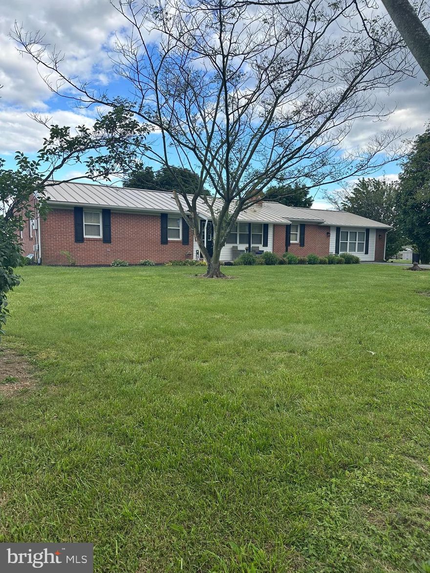 Lovely all Brick 3 bedroom, 2 bath rancher with a full basement situated on a 1.5-acre lot in South Berkeley County!  This home has been updated and is in great condition.  Features include living room with fireplace that has a woodstove insert, formal dining room, split bedroom floor plan that has been used as an in-law suite in the past with a family room, bedroom and private entrance. Other features include a well landscaped level yard, fenced in the back and garage that's perfect for mowers and outdoor equipment. Move in ready!!