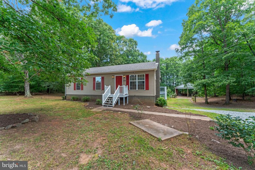 Welcome to 1543 Vawter Corner Rd in Louisa, VA! This beautifully remodeled 3-bedroom, 2-bath home sits on a private 2-acre lot and offers the perfect mix of modern updates and country charm. The bright, open interior features fresh finishes throughout, while the updated kitchen includes brand-new stainless steel appliances—ideal for everyday living and entertaining.
The partially finished basement provides flexible space for a recreation room, home office, or gym, with plenty of room left for storage. Outside, enjoy the expansive concrete patio overlooking the peaceful backyard, or take advantage of the impressive 32x32 pavilion—perfect for storing a boat or RV, or for hosting outdoor gatherings.
Located just 15 minutes from Gordonsville, this move-in ready home offers quiet rural living with easy access to nearby amenities. Don’t miss your chance to make this inviting property your own!
