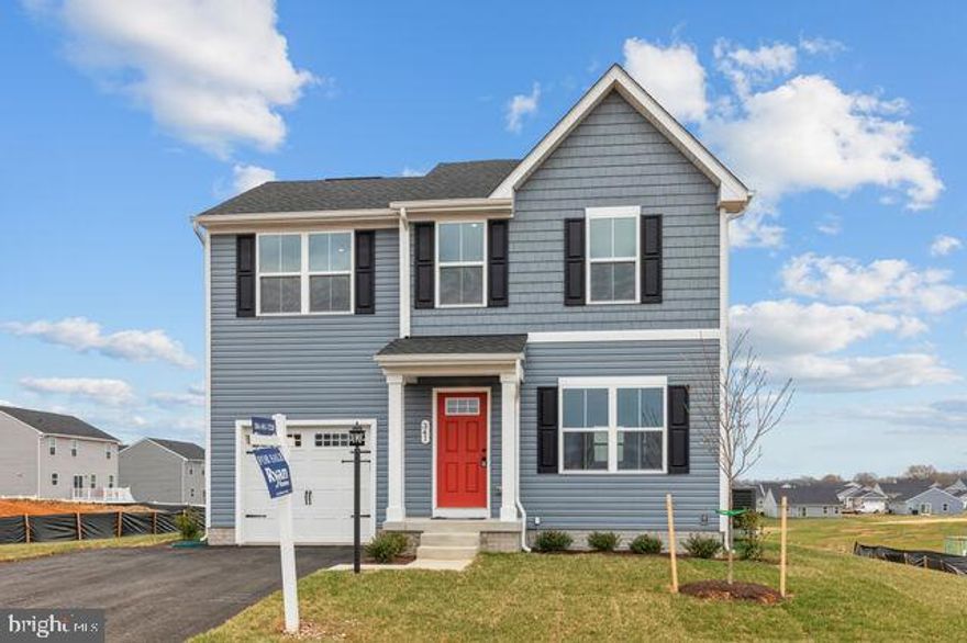 IMMEDIATE DELIVERY Dogwood w/ Basement at Cardinal Pointe!  A beautiful great room invites friends and family to gather. The adjoining gourmet kitchen features plenty of counter space and stainless steel appliances.  A half bath on the main level adds extra convenience.  Luxury vinyl plank has been extended to the great room and 4 ceiling fan rough/ins are included throughout the home.   Upstairs, your luxurious primary suite includes a private en suite bathroom and a walk-in closet. Two more bedrooms share a hall bath. The unfinished basement can be completed later for more living space, as we've added the plumbing rough-in for you. The one-car garage includes extra storage at the rear for bikes and more. Discover all the Dogwood has to offer.  The convenience at Cardinal Pointe, along with sidewalk-lined streets, a tot lot, and fenced dog park, make this community a great place to call home. Just minutes to I-81, shopping, dining, schools and medical facilities... ALL, less than 15 minutes from Hagerstown!