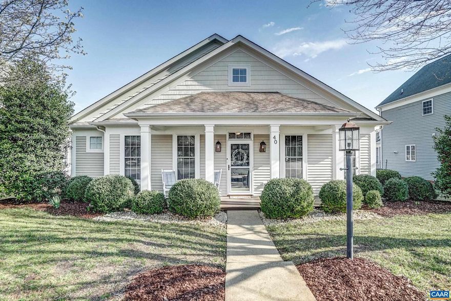 This stunning home in the highly desirable Spring Creek community features one level living and lovely charm. Hardwood floors gleam throughout the main living areas, and arched doorways make a statement. The first floor is complete with a generously sized updated kitchen featuring maple cabinets, granite counters and stainless appliances.Entertain in the formal dining room, and gather in the great room with gas fireplace.  Owner's suite features an ensuite bathroom with jetted tub and separate shower. Two additional bedrooms, full bath and laundry complete the first level. Upstairs can accommodate so many uses from a 4th bedroom, media room, gym, rec room, home office, storage, etc.The garage has room for 2 cars and your golf cart!  You'll love the outdoor living spaces including composite deck with pergola, and covered front porch.  All of this is within a walk to the clubhouse, swimming pool and golf center of Spring Creek. Are you ready for resort style living?,Granite Counter,Wood Cabinets,Fireplace in Great Room