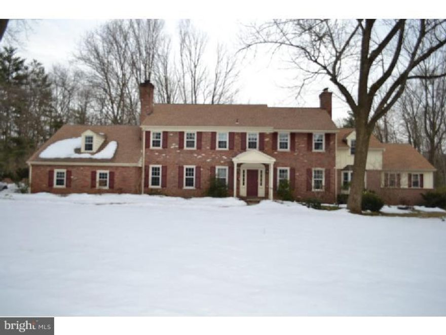 This stately Georgian Colonial is located in one of the most coveted  neighborhoods in northside Villanova.  The exquisite grounds are entered  through a charming brick fence with wrought iron gates leading into beautifully landscaped grounds with a new salt water pool and spa. The grounds are  enhanced by specimen/hybrid trees, exquisite plantings and seasonal perennial flowers. Prepare Thanksgiving stuffing with your own American chestnuts! In the winter, step down into the Lord and Burnham greenhouse off the elegant dining room. The large living room with a custom built in entertainment center has a beautiful wall of windows that overlook the sylvan setting. A cozy family room off the kitchen enjoys a gas burning fireplace, cable hook-up and custom built in cabinetry. The Master Suite with an en suite bath, cathedral ceiling, gas burning fireplace and a dressing room is complete with an island, multiple built-in closets, and it's own washer/dryer room.  The gym is off the master bath, so there's no excuse to skip a work-out! The four bedrooms on the second floor allow for a second master suite with dressing room and an en suite bath, with a view of the lake. The guest room, also with en suite bath and a hall bath with two additional bedrooms complete this floor.  The walk out lower level features a full bath, media room and a possible au pair suite. Additional special features include: radiant heat in the en suite bathrooms, beautiful hardwood floors throughout, over 5,500 square feet of living space, cul de sac street, and no need to worry about loss of power! The back-up generator comes on automatically and is fueled by the street gas. Ideally located in the award winning Lower Merion District, this home is very convenient to all that the Main Line and Philadelphia has to offer. ENJOY!