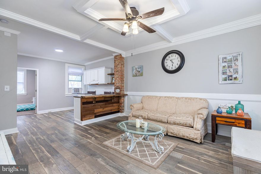 RECENTLY RENOVATED 2-UNIT MULTI FAMILY HOME IN ORANGEVILLE - this updated home features a 1 bedroom apartment upstairs and a 1 bedroom apartment on the main and lower level.  New flooring throughout, fresh paint, an abundance of crown molding and wainscoting detail, updated kitchens & bathrooms and a large one car detached garage with deck on top.  Great for investor or homeowner looking for income property.