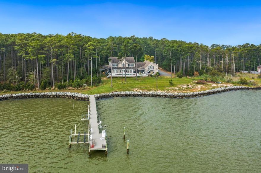 Your multi-generational family memories start with this waterfront home offering  4+ bedrooms and 4 full & 2half baths, located on McKeil Pointe which juts out into the Little Choptank River. Live where you want
to retire. Bright natural light and panoramic water views of Fishing Creek are just the start of your connectionwith nature. Your 4.5-acre private hideaway shares space with eagles ospreys migrating birds  deer foxes and loblolly pines.
As you walk up the front steps you will appreciate the shaded deep veranda leading to the entrance to
the home. Opening the front door, you will be taken back by the Brazilian cherry hardwood floors, hand
laid throughout the home. The living room offers a cathedral vaulted ceiling, inviting gas fireplace, and
fantastic water views overlooking the heated pool, nestled in a large deck that will provide an
entertainment space for all your guests.
The gourmet kitchen is centered around a person's love for preparing meals and sipping wine,
expressing joy through their culinary treats. The design and layout of the space will be appreciated by
any home chef. On cool nights, enjoy sitting in front of your Vermont Castings stove.
Off the kitchen is the laundry wing, with extra refrigerator, washer & dryer, plenty of storage space,
access to one of two attic areas, and a half bath. The room leads out to a screened-in porch serving as a
resting place for pool guests.
Next to the gourmet kitchen is the formal or casual dining room for a quiet dinner for two or a larger
gathering of family and friends.
On the other side of the living room, French doors open to the waterside owner's suite. Sliding doors to
the deck allow a caressing breeze to insure a good night’s slumber. Full bathroom with Jacuzzi tub, large
walk-in shower, and double sinks. Two walk-in closets complete this owner’s space.
The comfy den with its own porch provides a quiet spot for resting, reading, and relaxation.
Access to the second floor by an elegant staircase brings you to two offices/bedrooms sharing a full
bathroom. Across the balcony, French doors lead to the second owner's or private guest suite, with
beautiful water views, full bath, walk-in closet, and access to a second large attic.
An outstanding feature of this family home is the guest apartment tucked away above the oversized
attached 3-car garage, with 2 bedrooms, full bath, fully equipped eat-in kitchen, living room and
waterside balcony with access to the pool deck,
The detached 2-story outbuilding has two bays that can be used as a workshop or to store small boats
or a tractor. The climate-controlled upper level provides extra storage, studio, or gaming area for
cousins to hang out.
The property is not in a flood zone and is completely rip rapped to protect your shoreline. The 120’ pier
has 3 boat lifts and a floating dock for launching canoes and kayaks. The MLW is 3'. With a quick boat
ride past McKeil Pointe, you will have wind in your hair and bow spray around. You'll be refreshed on
your morning fishing trip to the Chesapeake Bay
Finally, the property is on the lee side in a protected cove where sailboats seek safe harbor. A minute
of pause will confirm that you are in the moment of now and live in a very special place. Generational
family memories are made at 5119 Brook Road.
1st Floor
Foyer Hardwood floor through out the house, access to wrap-around porch
LR Bay window access to private porch
Family Cherry built-ins gas fireplace access to pool
Kitchen Eat-in sitting area Vermont casting stove great appliances 
DR Bay window off butler & kitchen
Laundry access to private pool porch garage stairs to guest suite
Primary BR French doors 2 walk-in closets bay window access to pool
Primary Bath Bay window whirl pool tub double sink
2nd Floor
Primary Br 2 French doors waterviews walk-in closet w full bath
Primary Bath Bay window whirl pool tub double sink separate toilet
Two offices sharing Jack and Jill w loft
Guest suite 2 br1 br  w kitchen lr dr balcony
