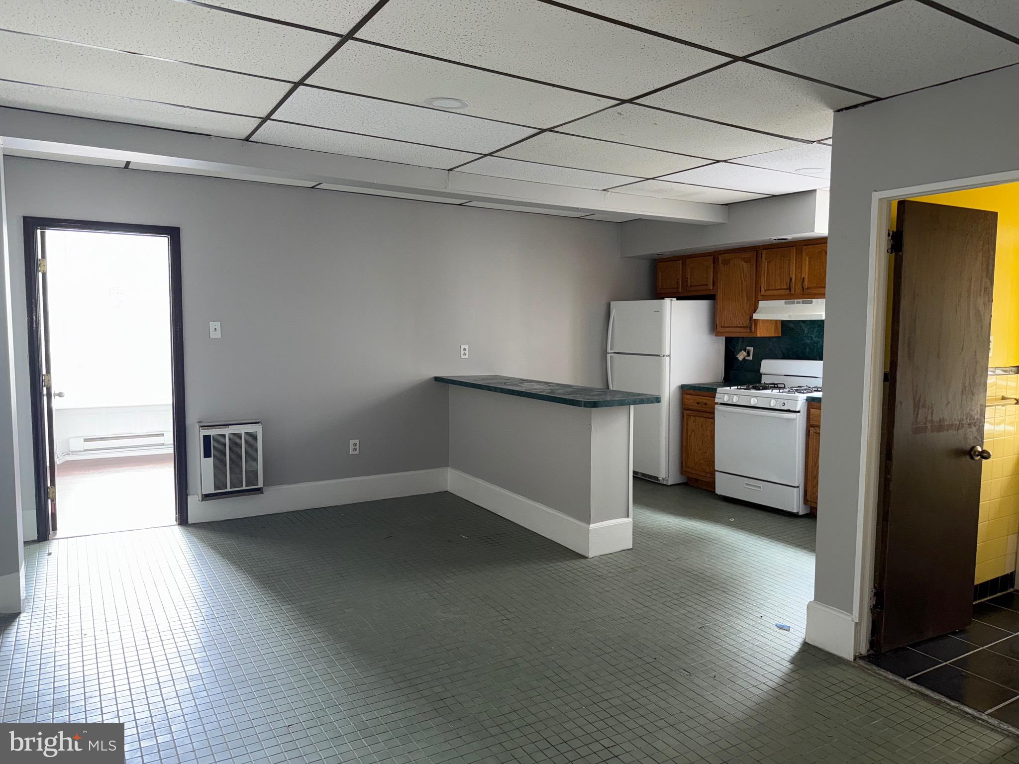 Discover comfortable living in this spacious 1-bedroom, 1-bath apartment at 2213 W Tioga St, Unit 2A, nestled in the Tioga section of North Philadelphia. This well-maintained unit features a bright and airy living space with large windows, a tiled kitchen with plenty of cabinet storage and a refrigerator, and a cozy bedroom with a custom closet and built-in vanity. Professionally managed for peace of mind, the property is ideally located near Temple University’s Medical campus, public transit, and local shopping options.