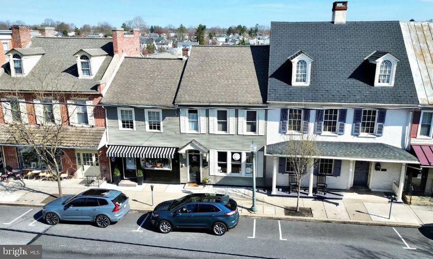 COMING SOON! Showings commence April 13, 2026. Highly sought opportunity to own commercial property along Main Street in the heart of downtown Lititz, PA. This historic building at 55–57 East Main Street is thoughtfully configured for 3 commercial tenant spaces, offering immediate income potential and long-term flexibility. The second floor is currently owner-occupied and will be delivered vacant at settlement, creating an opportunity for an owner-user or additional leasing upside. Two first-floor storefronts are leased to retailers, benefiting from exceptional pedestrian traffic and year-round tourism. The property features a highly desirable *on-site parking lot* for 8–10 vehicles.  Downtown Lititz is widely celebrated for its walkable Main Street, lined with boutique shops, restaurants, and local attractions, and has been named “America’s Coolest Small Town” by Budget Travel. The area draws consistent visitor traffic thanks to its historic charm, vibrant local business community, and popular events such as the Fire & Ice Festival and seasonal street festivals. With roots dating back to 1756 and a reputation for a unique destination, Lititz offers a rare blend of heritage and economic vitality. Potential for more than 3 Tenants with existing configuration.    SELLER PREFERS SETTLEMENT IN JULY.     See brochure for property and lease information.