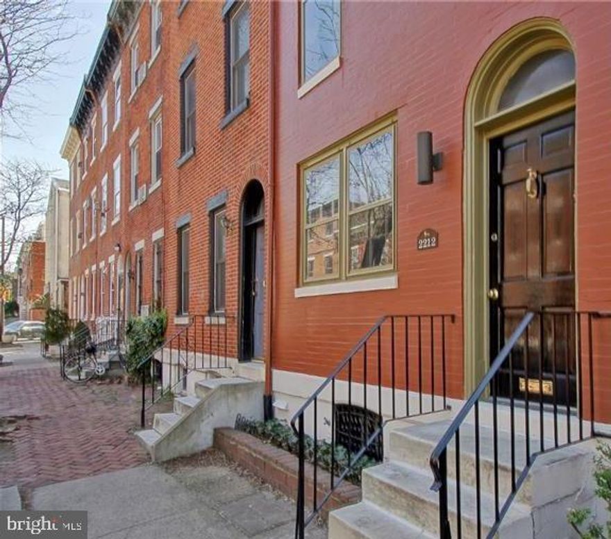 Welcome to FITLER SQUARE and a classically renovated townhouse by Newton Levine, Architect, into a Modern reconversion built around a 4-story central skylight inner atrium with Solarium and private 30-foot landscaped garden flooded with natural light.  This architecturally designed gem has been renovated by the current owners in the last 5 years,  freshly painted in neutral palette,  refinished hardwood floors throughout, boasts a  new luxury custom kitchen/dining area and  4 fireplaces. Essential new systems and updates include recessed lighting,  windows and interior doors,  3 zoned central air system, water heater, washer/dryer, roof, roof deck,  slate patio and fencing, 2.5 bathrooms, Grohe hardware and more... 
The dramatic central staircase utilizes the space to its fullest benefit making the rooms of excellent proportions while maintaining the openness of the house as well as dividing the house into private bedroom/bathroom areas and public living spaces. First floor,  enter through the striking, spacious  and functional cooks kitchen/dining area perfect for casual dining and formal sit-down dinner parties, porcelain tile floors throughout this level, Thermador stainless appliances,  neutral quartz counters and plenty of storage cabinets. The rear living space, with working fireplace can be used as a library, family gathering place or office and overlooks the large south facing romantic garden with built in woodburning fireplace perfect for entertaining and relaxing, a private oasis.  The second floor living space features a large gracious living room with working fireplace and large French door style windows allow for light and air. A full porcelain tile bath and large rear bedroom complete this floor.  The third floor includes  two more large bedrooms, front bedroom with wood burning fireplace, ample closets and full marble bath, The spacious fourth floor can be used as a bedroom, playroom or media room accented by skylights and a north facing door leading to a comfortable roofdeck with spectacular city skyline views. Lovely basement powder room, wine rack, laundry, storage and mechanicals. Convenient to Rittenhouse Square, University City, hospitals, local parks, Schuylkill Banks Trail, neighborhood cafes, restaurants and shopping. Located in GREENFIELD CATCHMENT, THE PHILADELPHIA SCHOOL and GODDARD SCHOOL. One Year Prepaid Parking Space at nearby lot. Bonus One Year HSA Home Warranty is included in sale.  Homestead Exemption eligible for new homebuyers. Don't miss this one of a kind treasure!
NOTE: City of Philadelphia has conducted a real estate tax reassaessment, effective 1/1/23.  Any questions contact City of Philadelphia.