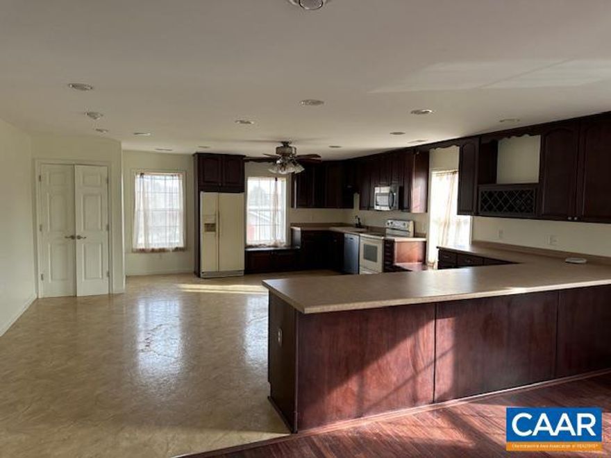 Spacious 2 Bedroom garage apartment & huge 3- bay garage! This unique rental includes a 1,600 SF 2 BR/1 BA apartment and 1,600 SF 3 bay Garage w/lift and air compressor! Beautiful corner lot in Barboursville located on 1 +/- acres. Large paved driveway and parking area with two gated entrances.  Additional 4 bay garage (1,798 SF) and 2 spacious outbuildings can be available for additional storage/work space. Ideal rental for mechanic, car enthusiast, or those looking for storage space! Property is zoned both residential and commercial. Owner/agent.