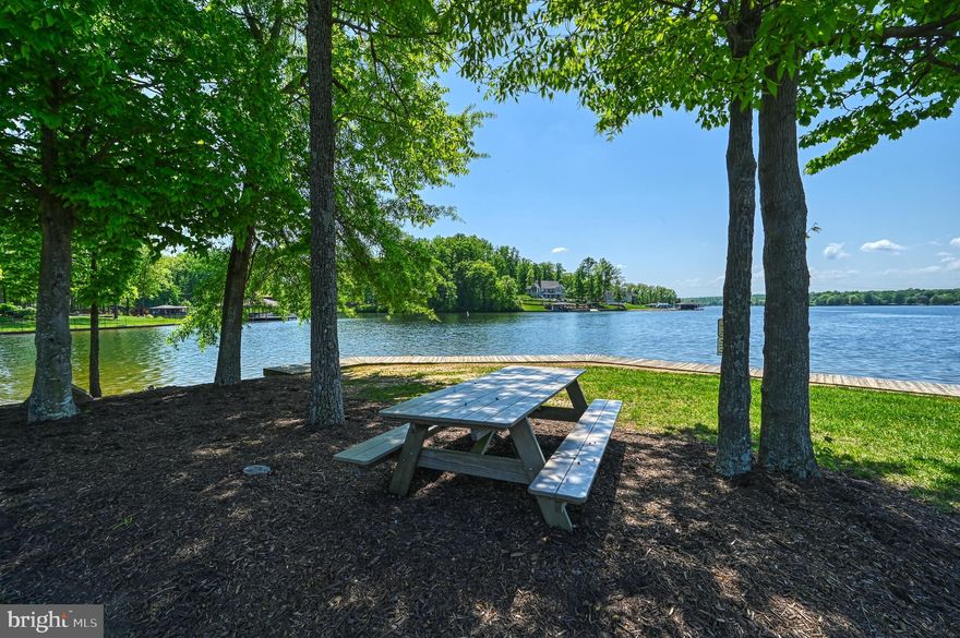 Covered boat slip with lift included. Located in the prestigious Mill Run community on the private side of Lake Anna, this lot offers the opportunity to build your ideal lake home and enjoy everything lake living has to offer. Spend your days on the water with easy access from your assigned slip, and relax in the beautiful common area designed for enjoying time by the lake. Mill Run is known for its well-maintained properties, peaceful setting, and sought-after location, making it ideal for both full-time living or a weekend retreat.