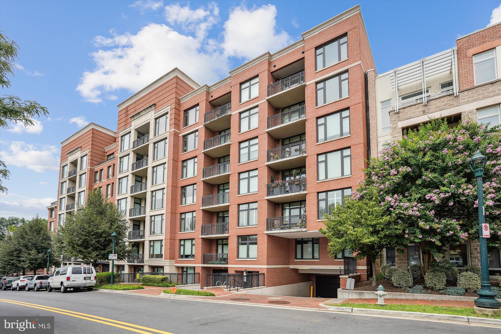 Luxury and spacious one bedroom condo is located in the sought after Hampden Row, which was awarded #1 Best New Luxury Condominium by Bethesda Magazine in 2017! Open concept main living area features high ceilings, wood floors, bay window, kitchen with stainless steel Bosch appliances, quartz counter tops, bar stool seating area and elegant lighting. Living area opens to charming balcony providing additional space for relaxing or entertaining. The bedroom, with scenic views, features floor to ceiling windows which overlook the delightful balcony, a walk-in closest and a luxurious bathroom with a double vanity. Washer/dryer in unit. Hampden Row offers unparalleled amenities including a 24/7 concierge. The rooftop deck with seating offers amazing city scape views and features a gas grill. The fitness room also located on this level has great views as well. Meeting room, and lounge offer additional spaces for the residents' use. Step outside and enjoy all that this dynamic, downtown Bethesda location offers including an abundance of restaurants, shops, Bethesda Row, library, and more! Just Blocks to Metro!