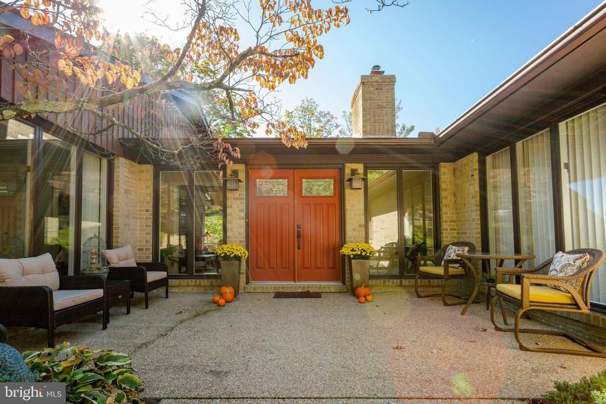 This classic rancher with its interior designed in the Frank Lloyd Wright style is ready to be your next home. It will be obvious when you see it, that the current owners have loved this home, property, and neighborhood for years and have cared for it meticulously. The main level is traditional in its 3 bedroom, 2 full bath, living room, dining room, and kitchen layout. However, the flow and space are anything but traditional as the living room is wider than typical and overlooks the back yard and deck. The kitchen space is brilliantly designed for efficient use with a daily table space and abundant storage. Additionally, the laundry, mud room and half bath space are a homeowners dream! The lower level, with walkout and full windows, feels as welcoming as the main level and has an additional family room, true bedroom, bonus room, and full bath, along with two big storage rooms. Some of the additional features are wood floors, top down bottom up cellular shades, pellet stove in lower level, wood stove insert in living room, ceramic tile baths, soft-close kitchen drawers, pantry in mud room, Frank Lloyd Wright-style hardware details, low maintenance updated decking, extensive patio hardscapes for outdoor living with outdoor lighting, and 2 storage sheds. Located within the Middletown High School district, close to 70 for easy commuting and in an established, quiet, and well maintained community.